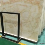 Backlit transcelunt yellow slab and tiles for countertops