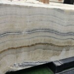 Grey wood onyx slab and tiles for countertops