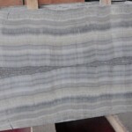 Grey wood onyx slab and tiles for countertops