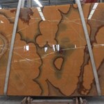 Orange nuvolato onyx slab and tiles for countertops
